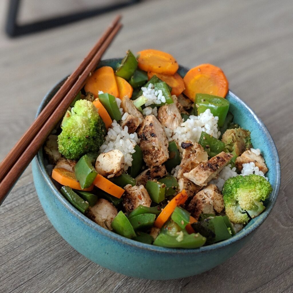 Chicken Tenderloin, Jasmine Rice, Steamed Broccoli, Carrots & Green